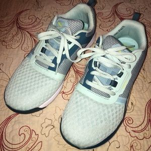 Puma sneakers size 8, light teal in color.